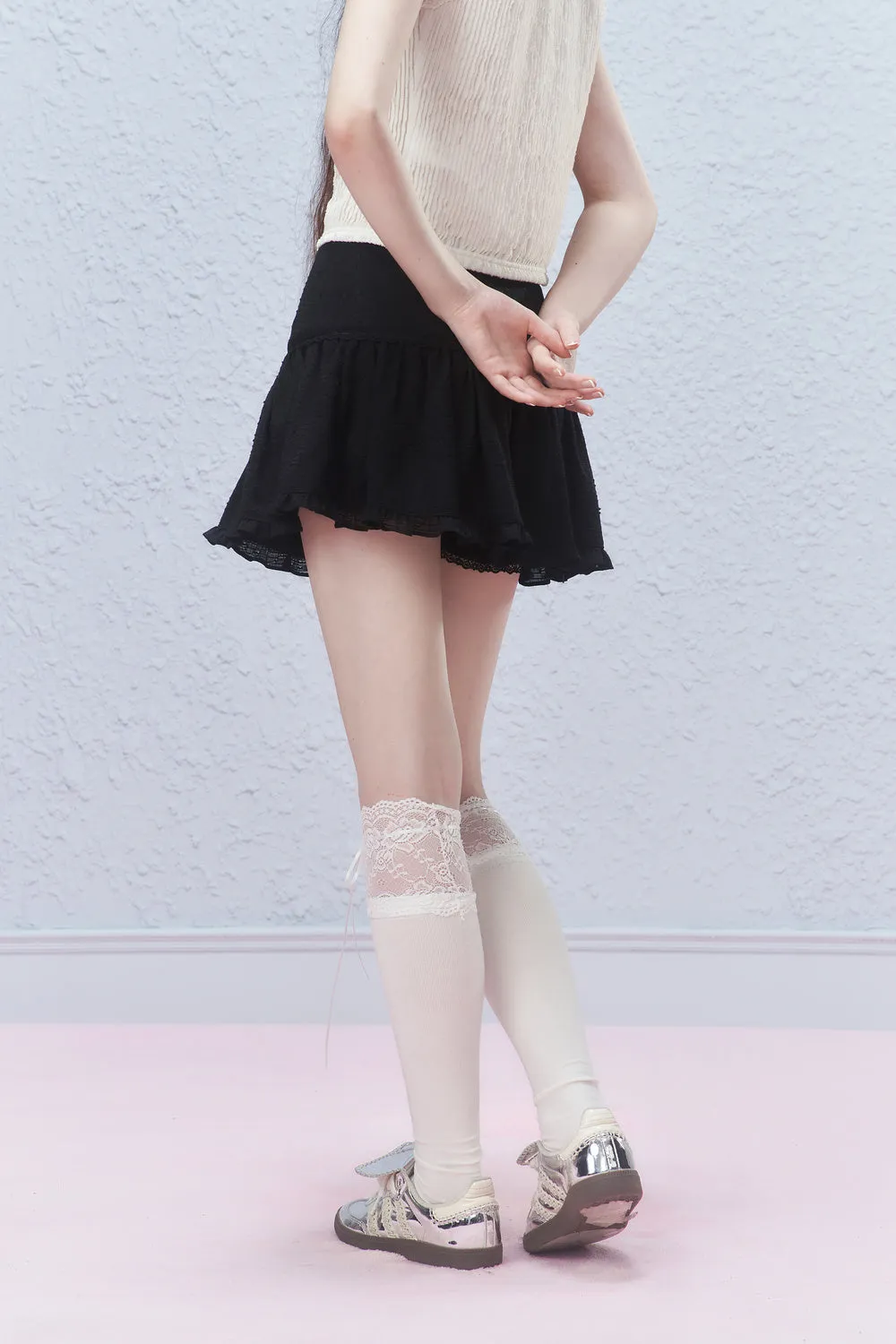 Ruffled Mini Skirt With Ruched Detail
